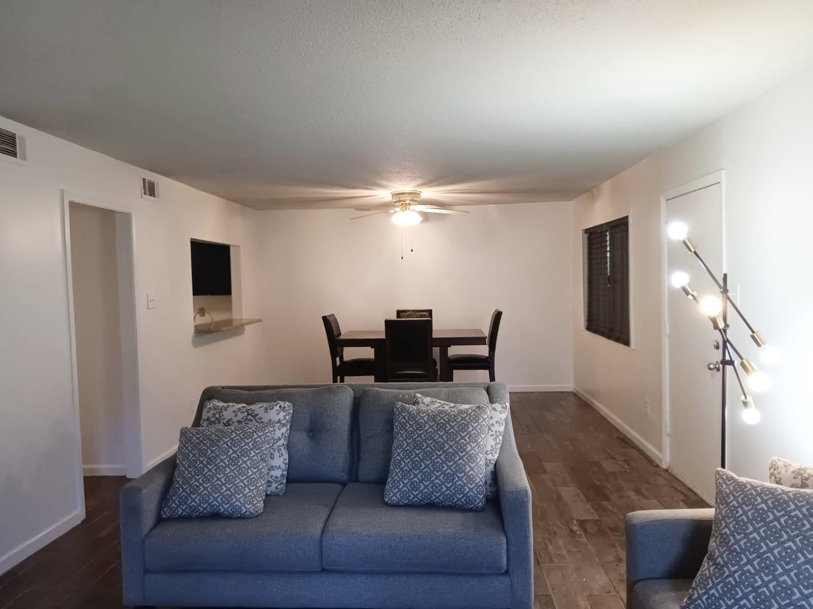 1770 Crompton 6th Square, Unit 29 Memphis, TN 38134 - Photo 5 of 21 Living room with dark wood-style flooring and ceiling fan