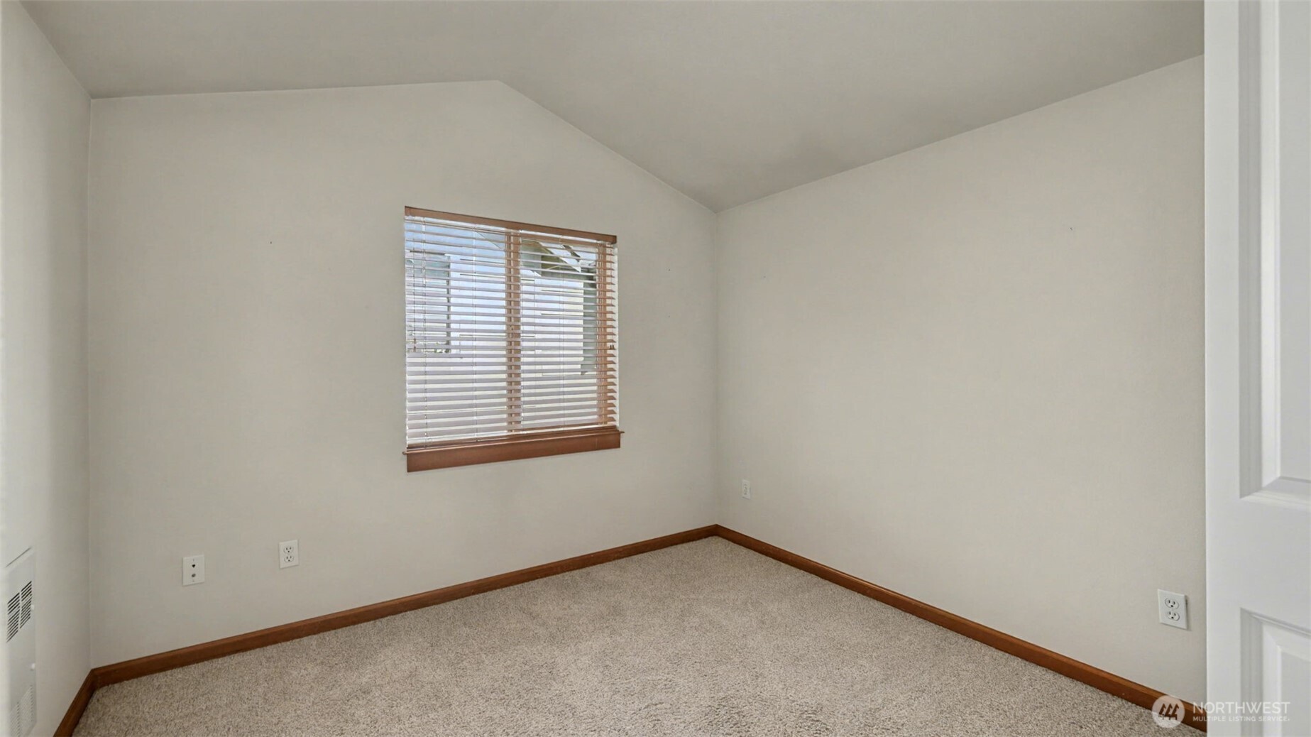 1120 North 92nd Street, Unit A Seattle, WA 98103 - Photo 18 of 22 a view of a room that has a window in it