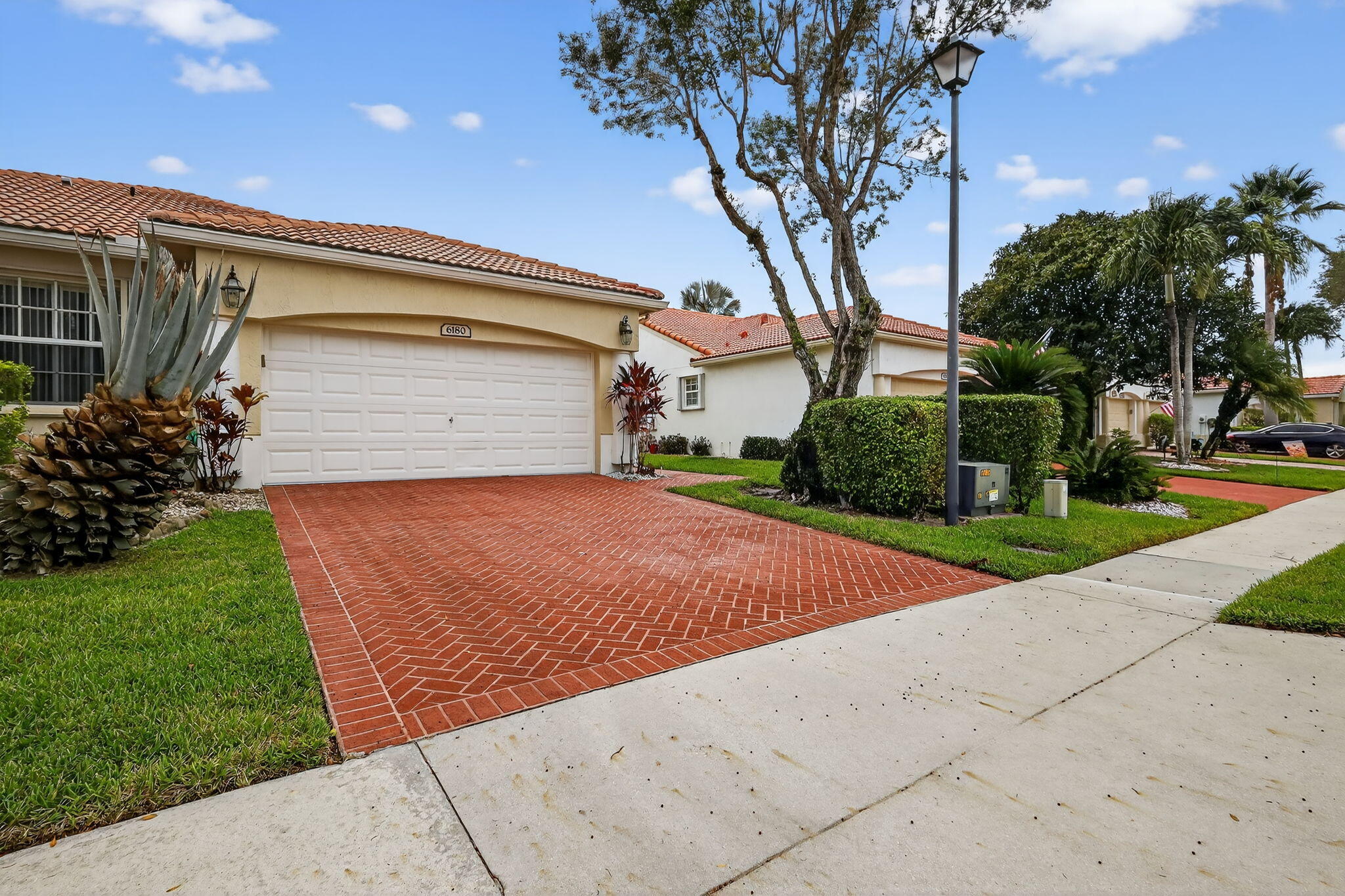 6180 Heliconia Road Delray Beach, FL 33484 - Photo 1 of 39 6180 FRONT 1