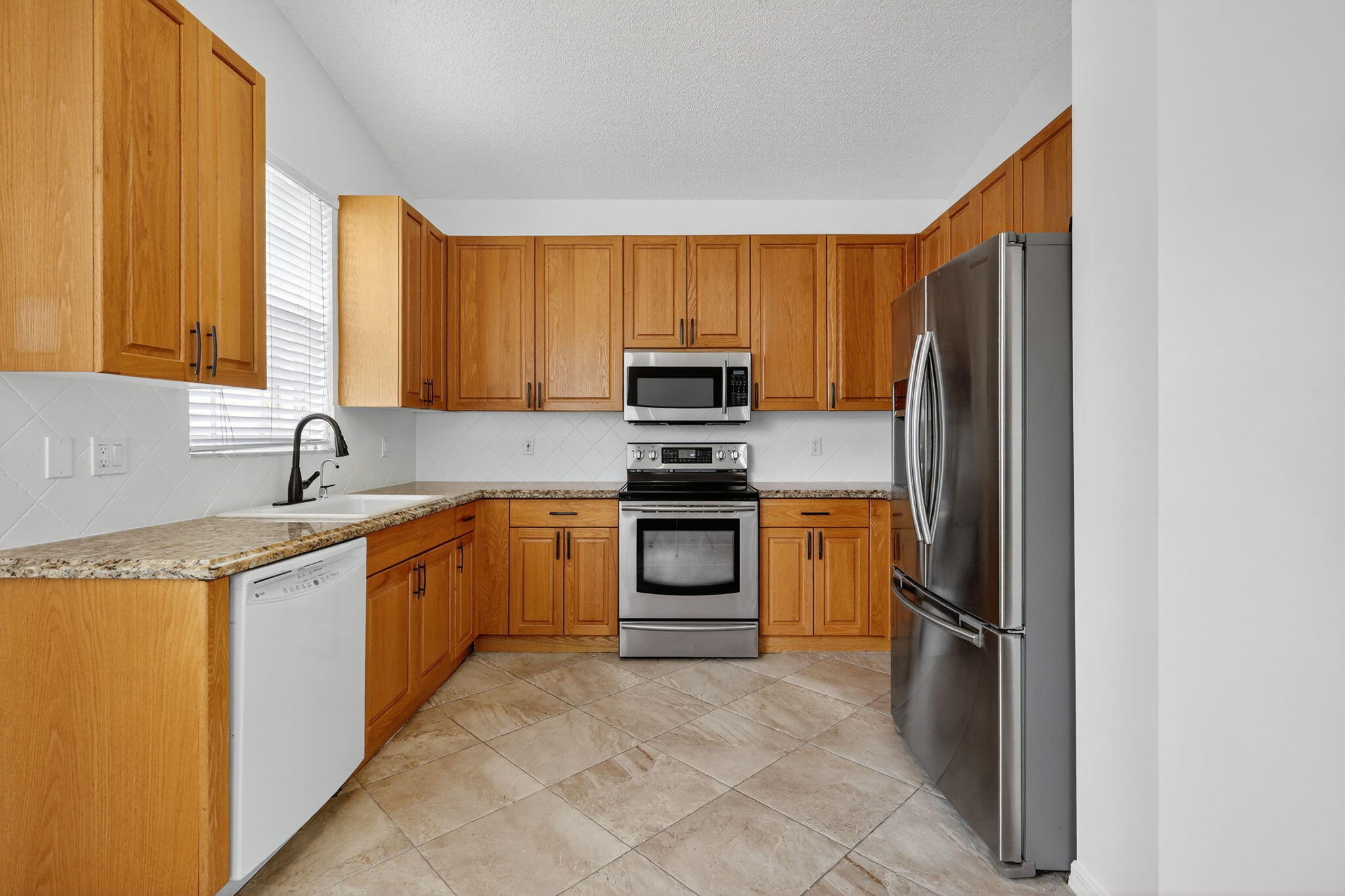6180 Heliconia Road Delray Beach, FL 33484 - Photo 5 of 39 6180 KITCHEN