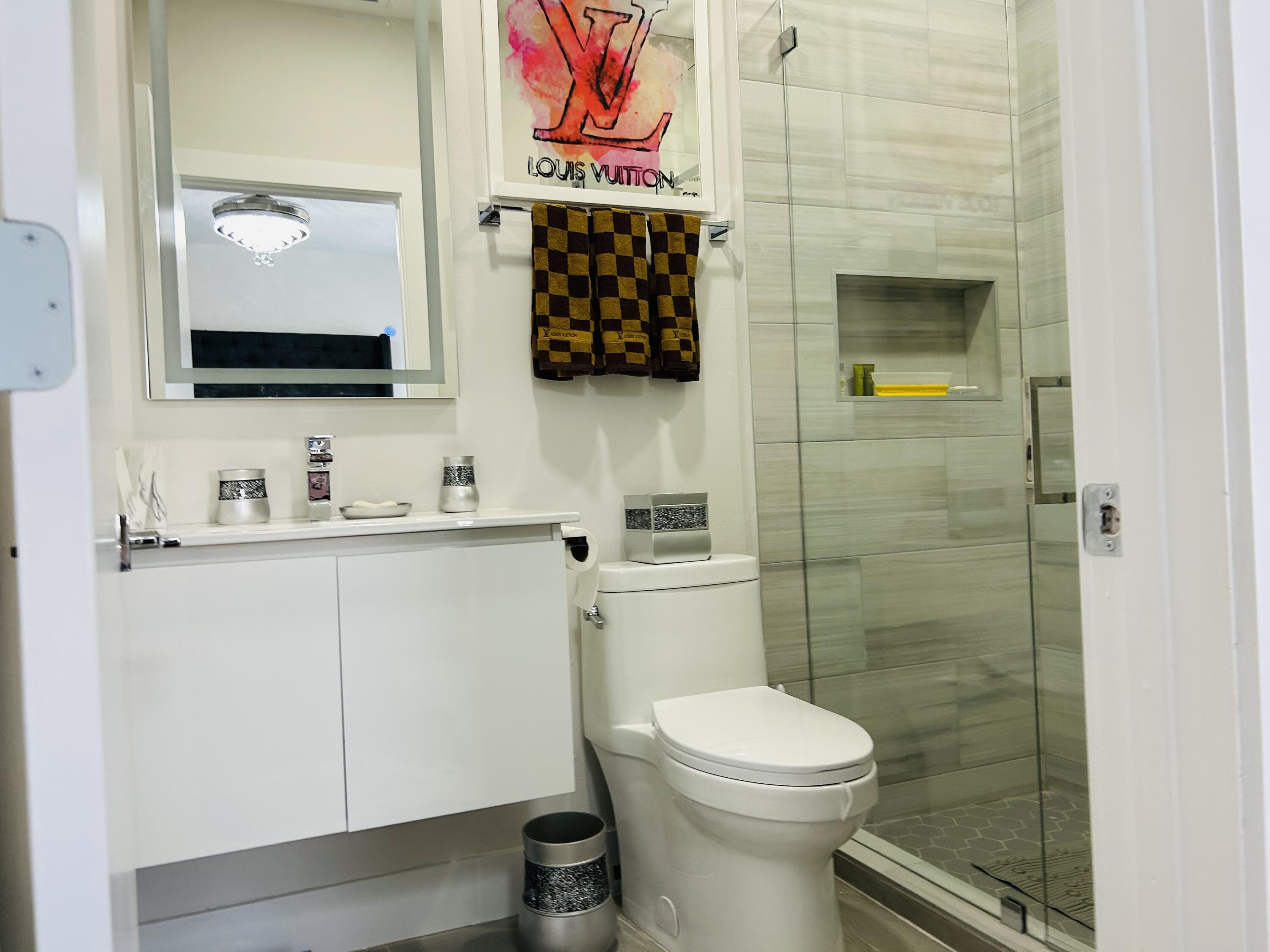 4126 Northwest 53rd Street Boca Raton, FL 33496 - Photo 26 of 61 Bathroom 2 - up