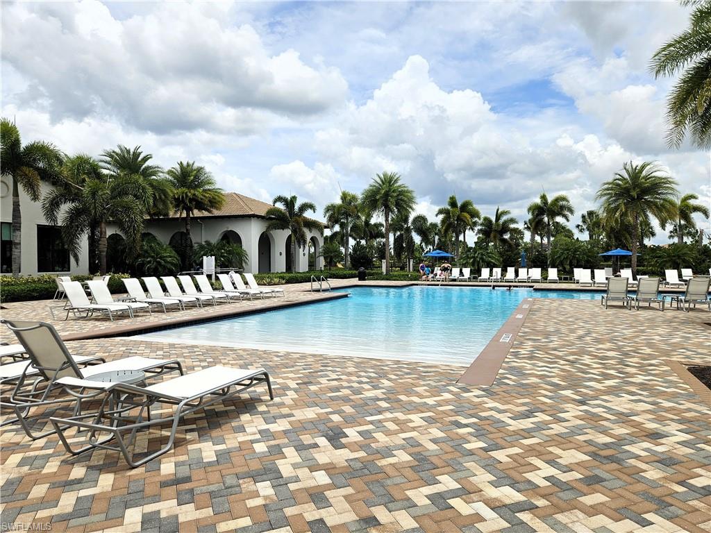 5169 Roma Street South Ave Maria, FL 34142 - Photo 46 of 49 a view of swimming pool with outdoor seating