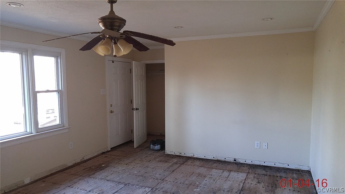 6731 Cherry Road Quinton, VA 23141 - Photo 6 of 13 a view of an empty room and a window