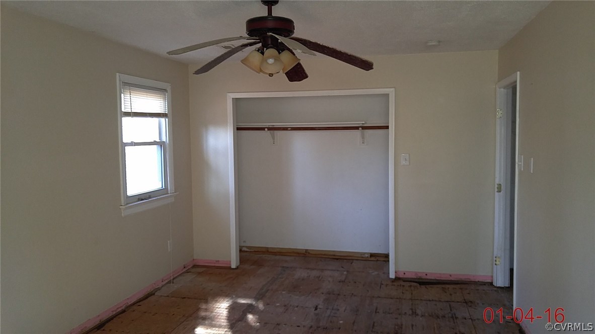 6731 Cherry Road Quinton, VA 23141 - Photo 9 of 13 a view of empty room with windows
