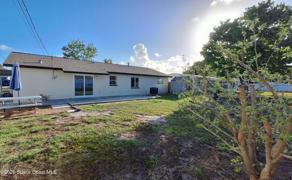 a house view with a outdoor space
