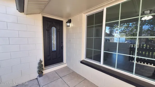 a view of outdoor space with sliding door