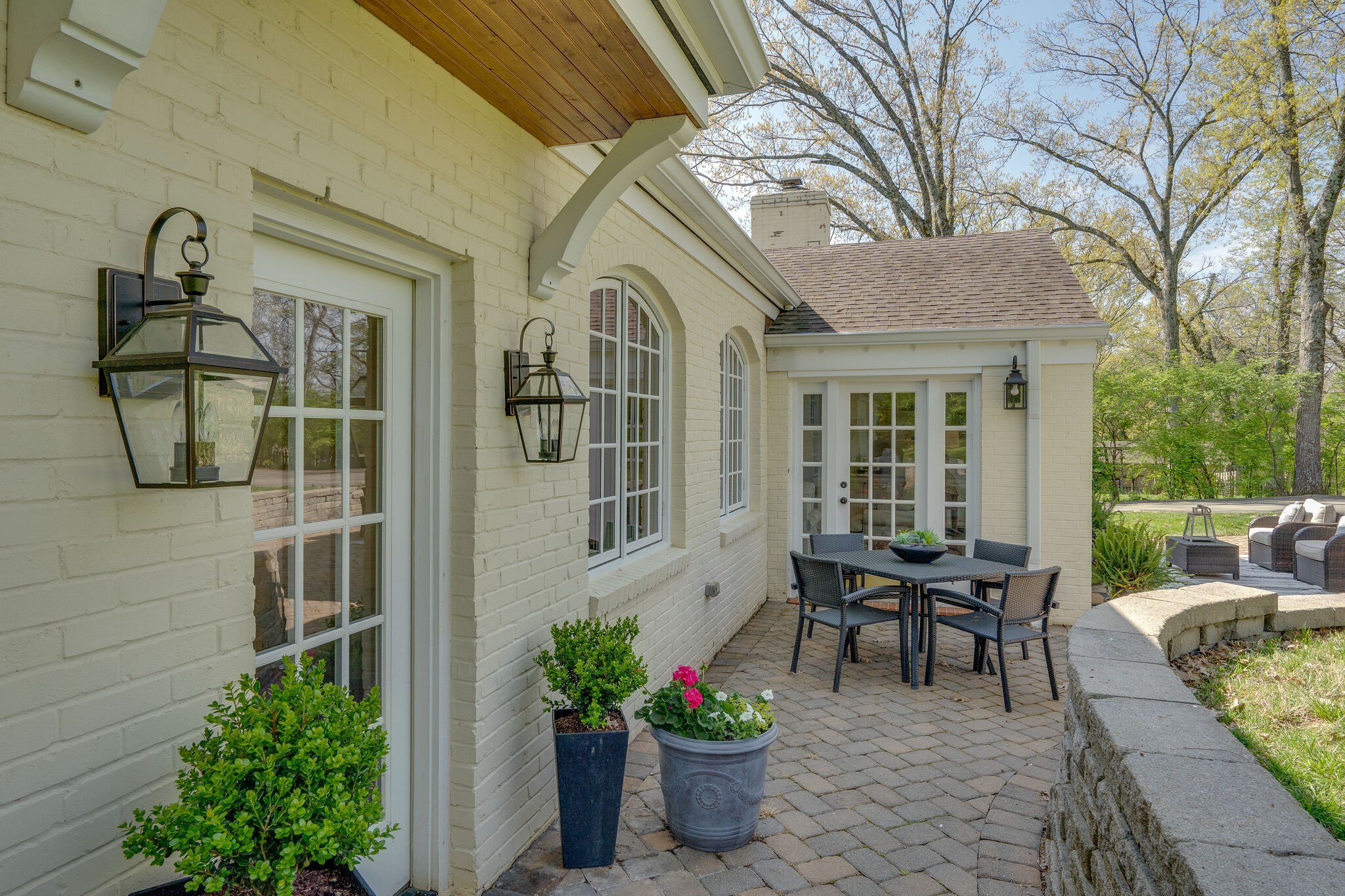 4321 Sneed Road Nashville, TN 37215 - Photo 33 of 37 a view of a house with backyard and sitting area