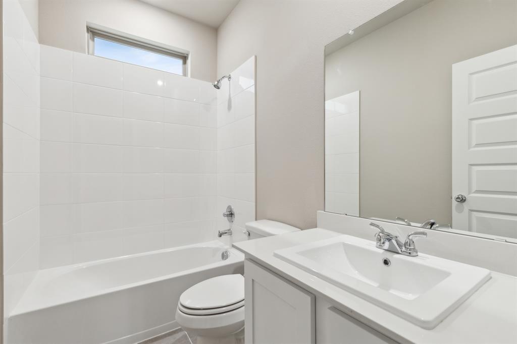 8356 Kingfisher Road Pilot Point, TX 76258 - Photo 24 of 32 Bathroom in the Elm home plan by Trophy Signature Homes – REPRESENTATIVE PHOTO