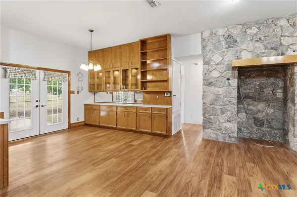 a view of a livingroom with wooden floor