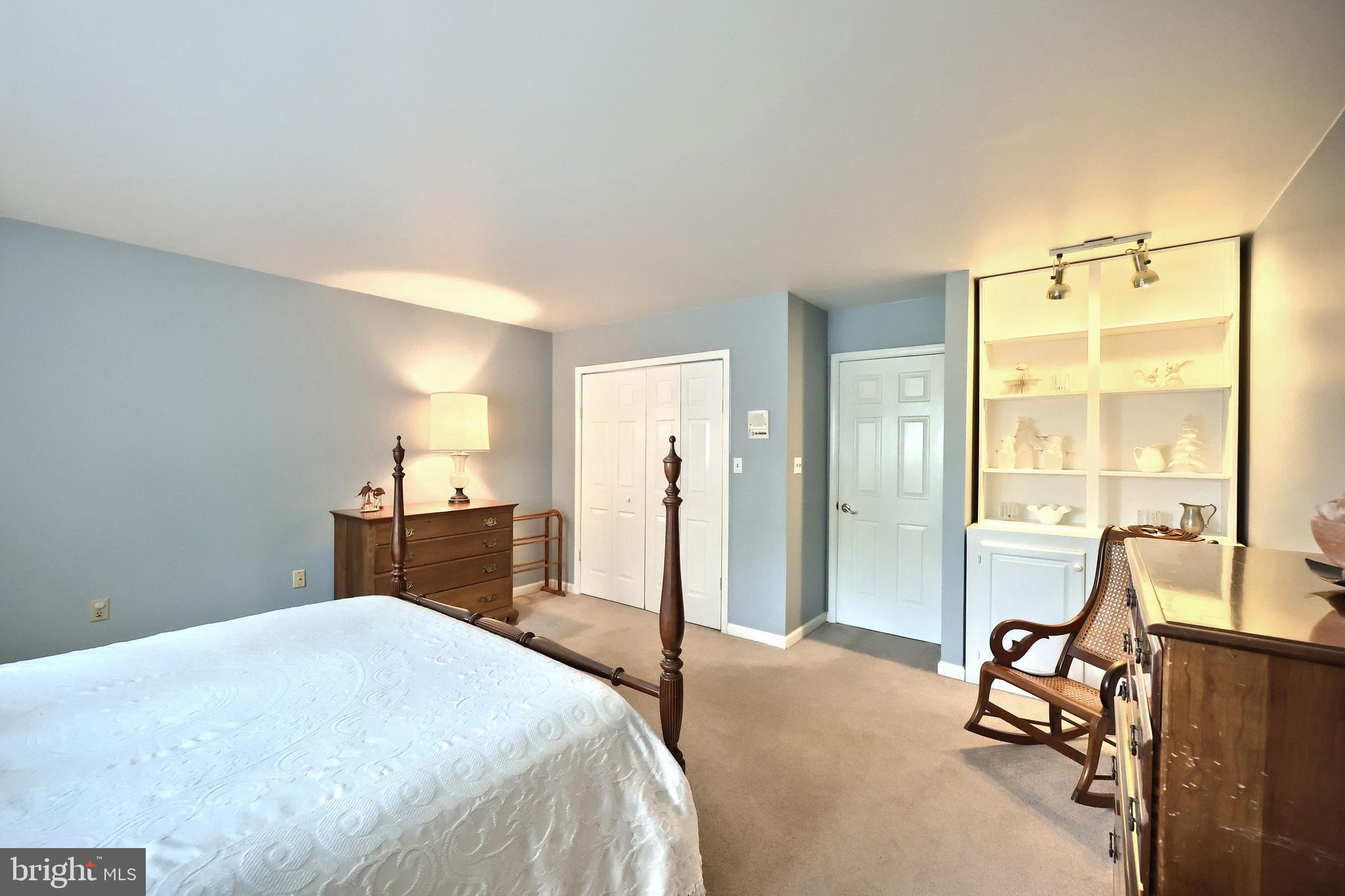 355 Sachs Road Gettysburg, PA 17325 - Photo 22 of 49 a bedroom with a bed and large mirror