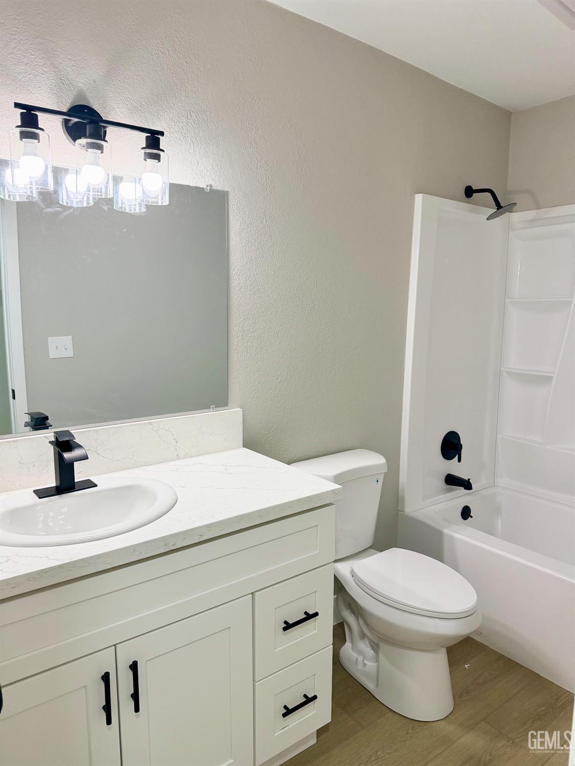 Undisclosed Address Wasco, CA 93280 - Photo 11 of 21 a bathroom with a sink a toilet and shower