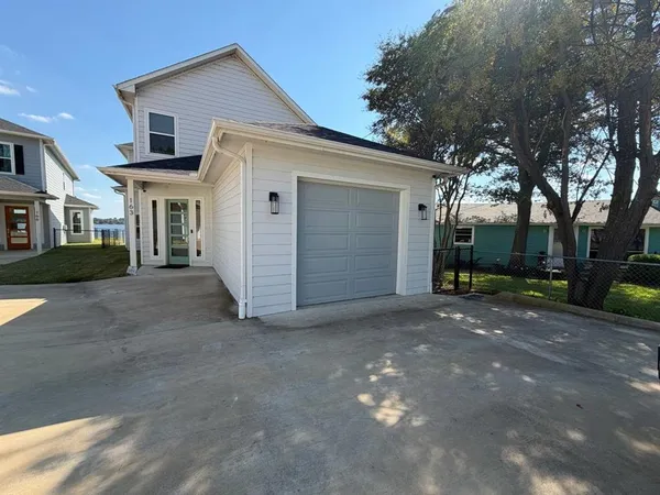 a view of a house with a street