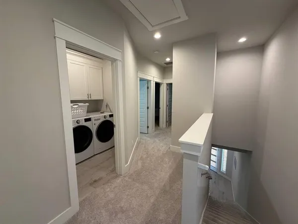 a bathroom with a sink double vanity and a mirror