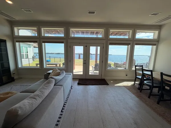 a view of a dining area with furniture window and outside view