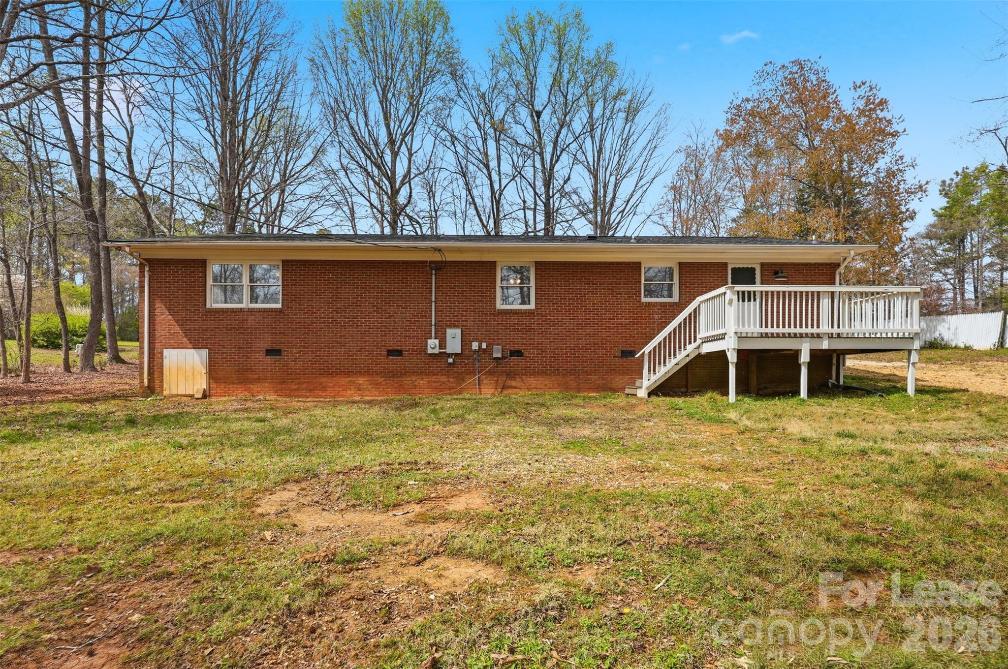 224 Yamasee Road Waxhaw, NC 28173 - Photo 14 of 22 a backyard of a house with table and chairs