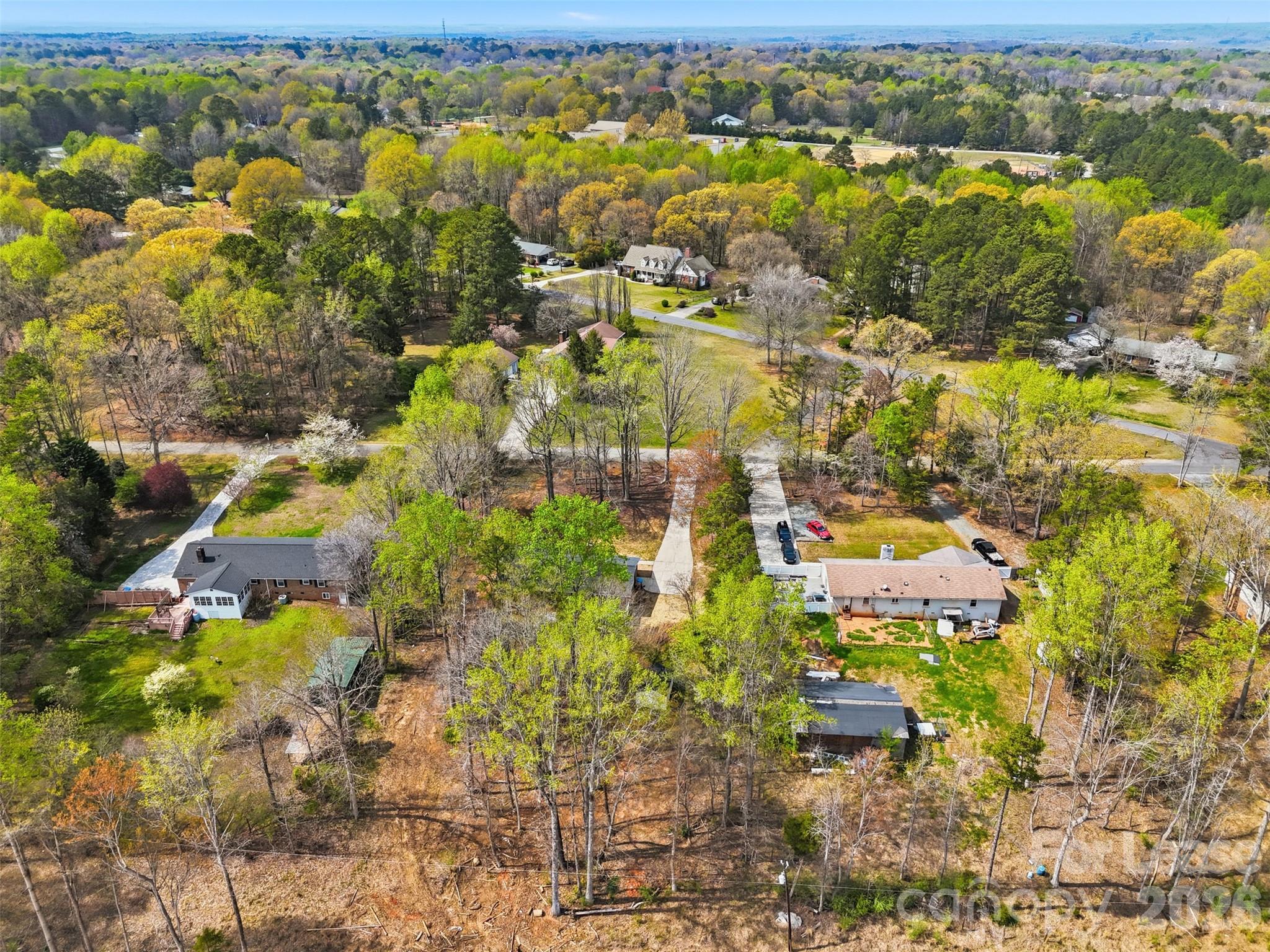 224 Yamasee Road Waxhaw, NC 28173 - Photo 19 of 22 a view of residential houses with outdoor space