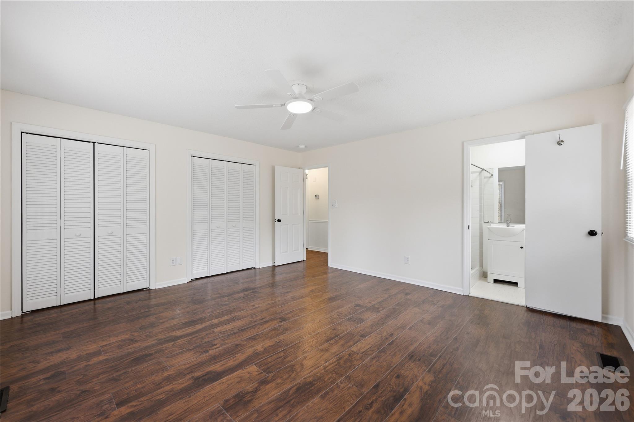 224 Yamasee Road Waxhaw, NC 28173 - Photo 7 of 22 a view of an empty room with wooden floor