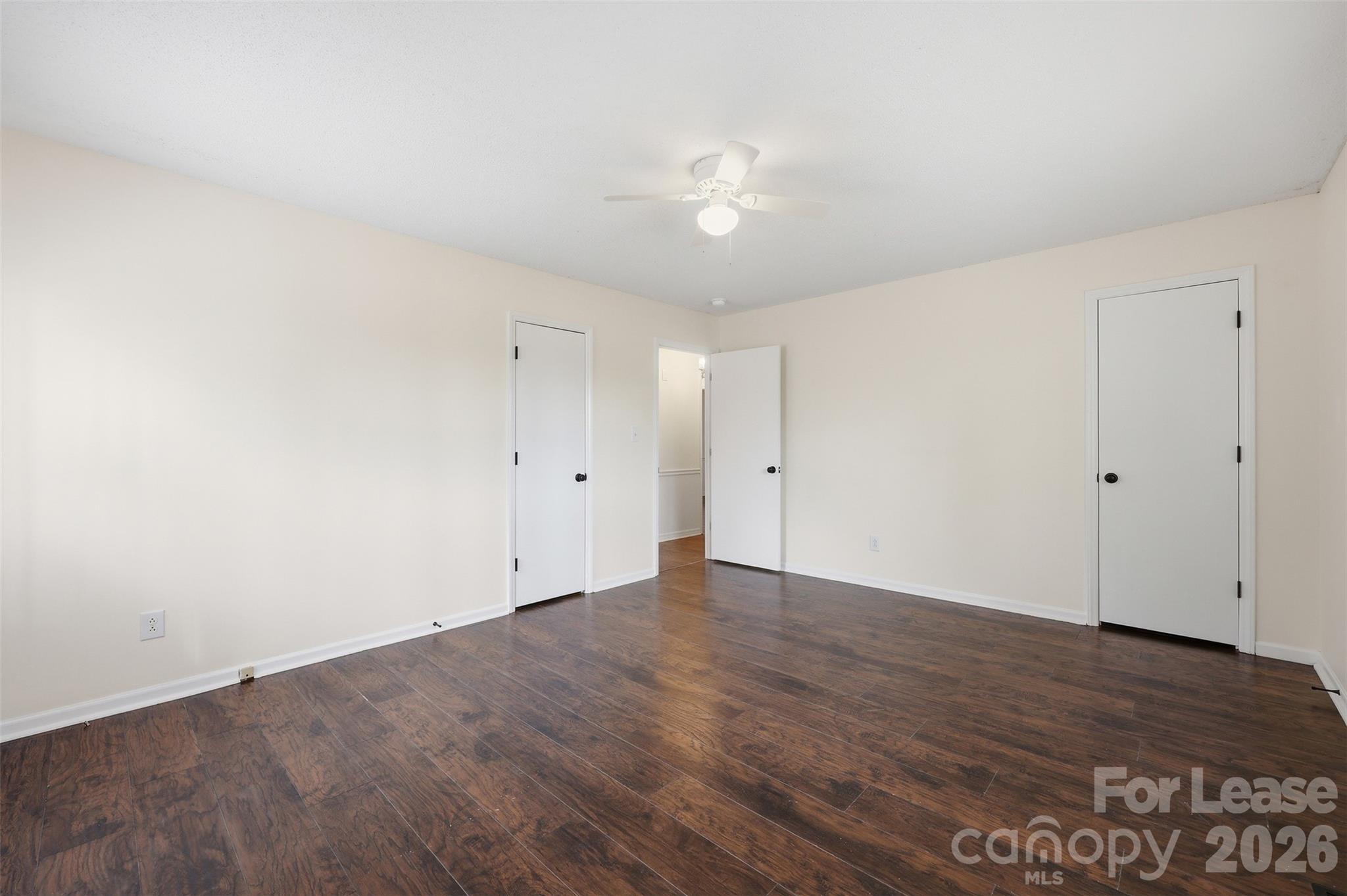 224 Yamasee Road Waxhaw, NC 28173 - Photo 9 of 22 a view of an empty room with wooden floor
