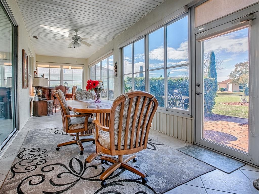 13324 Southeast 91st Court Road Summerfield, FL 34491 - Photo 30 of 46 a view of a dining room with furniture window and outside view