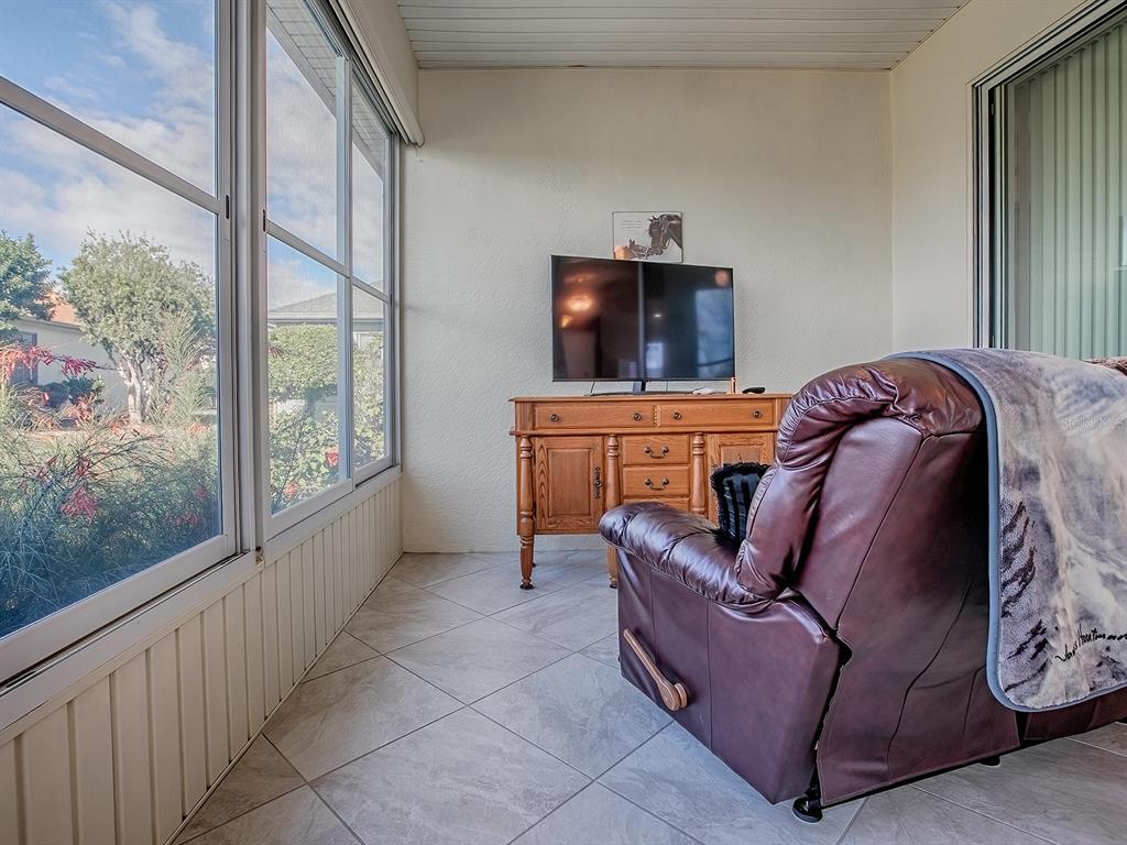 13324 Southeast 91st Court Road Summerfield, FL 34491 - Photo 33 of 46 a living room with furniture