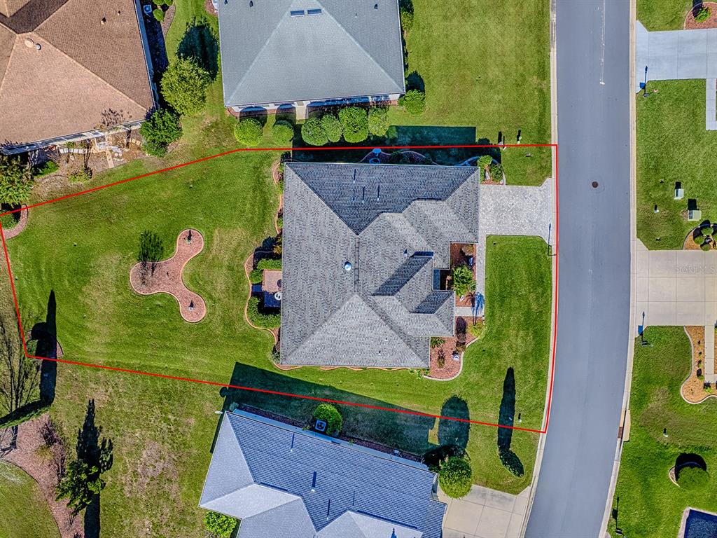 13324 Southeast 91st Court Road Summerfield, FL 34491 - Photo 41 of 46 an aerial view of a house