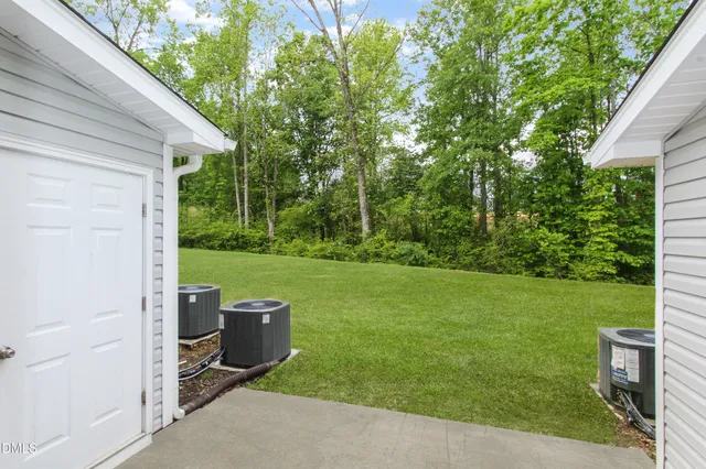 a view of a backyard with a garden