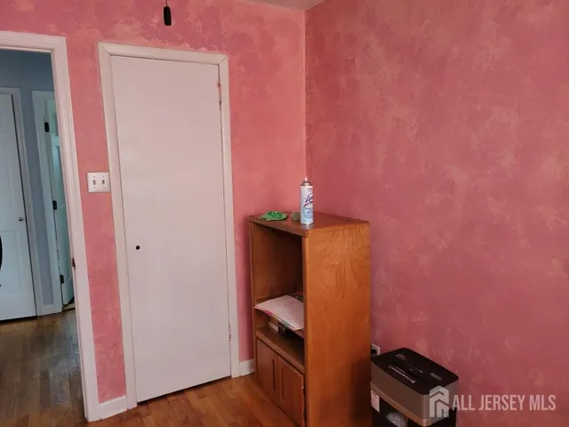 a room with furniture and air hockey table