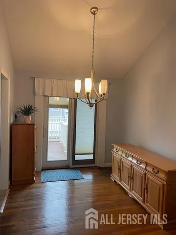 a close view of a sink and cabinets