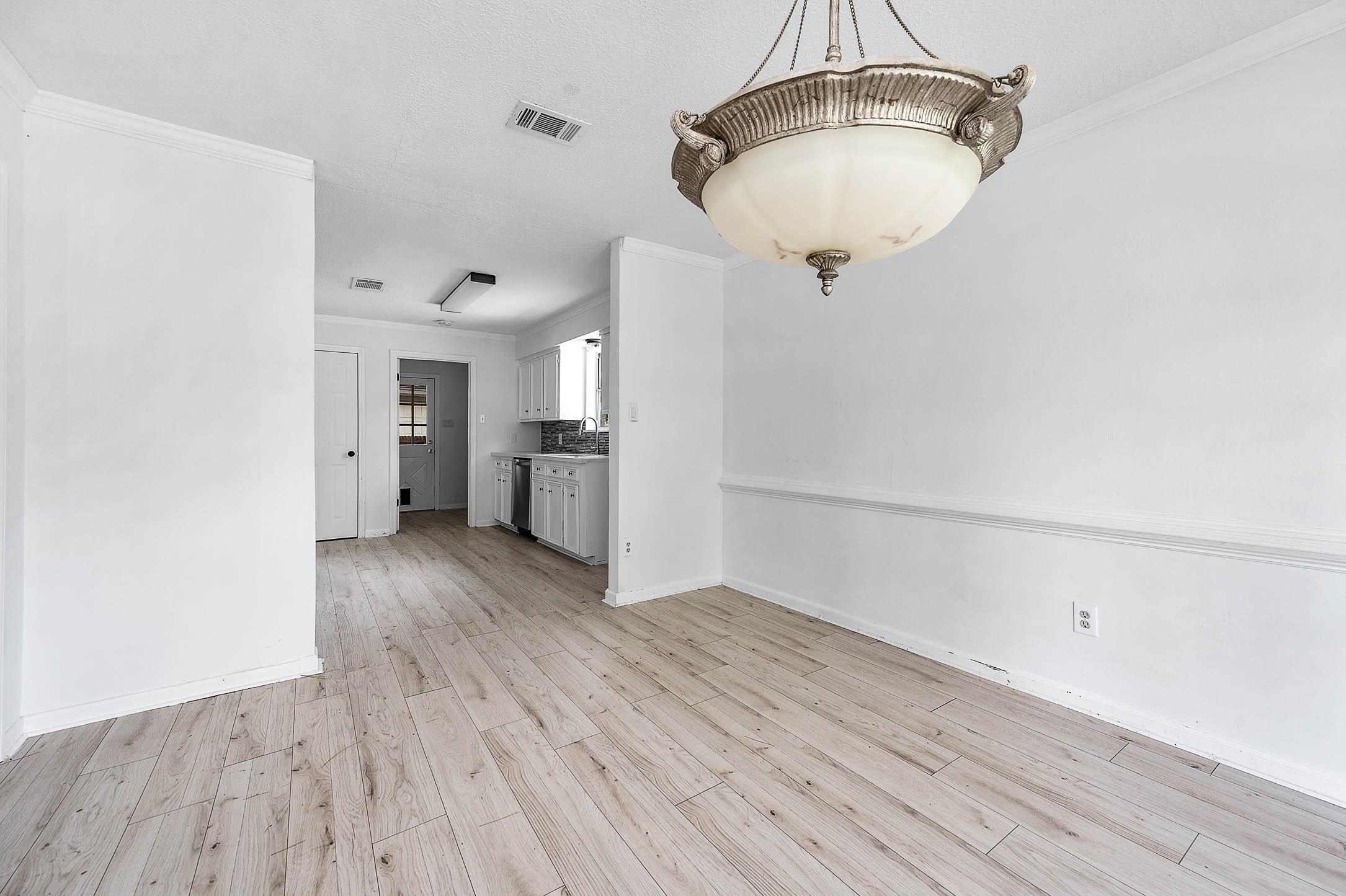 17627 Terrawren Lane Spring, TX 77379 - Photo 17 of 30 a view of a kitchen cabinets and wooden floor