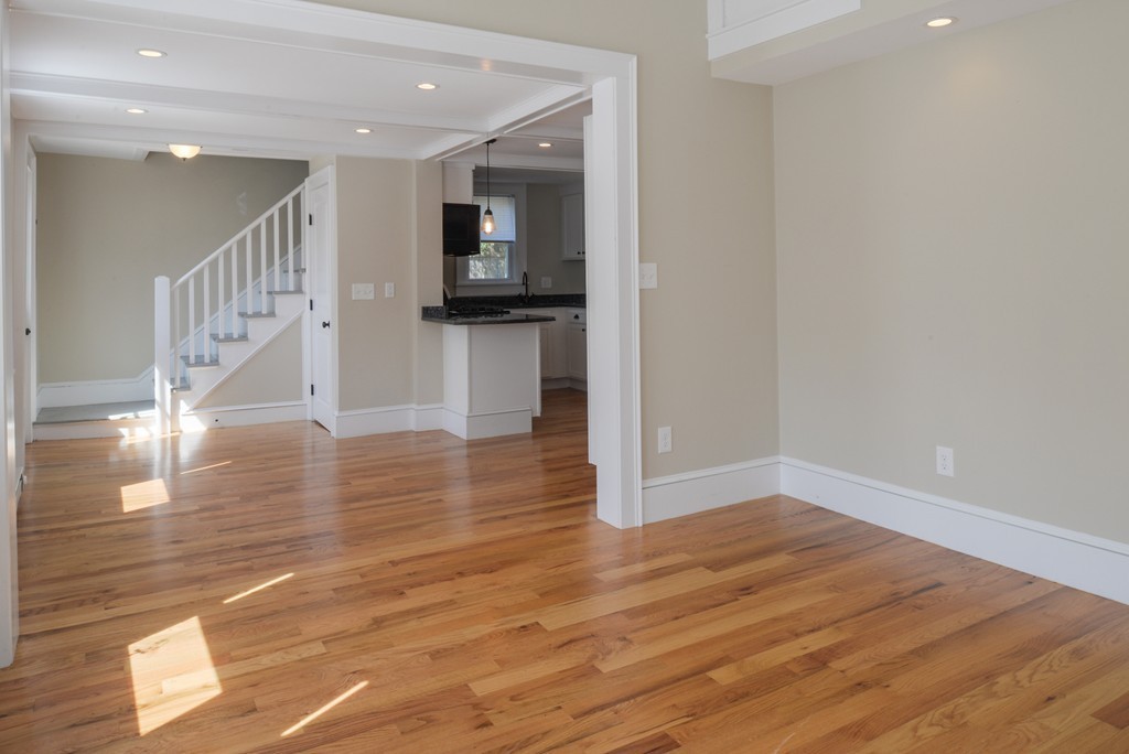 62 Eastern Point Road, Unit 1 Gloucester, MA 01930 - Photo 5 of 20 a view of entryway and hall with wooden floor