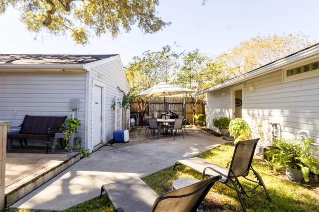 a view of a porch with furniture