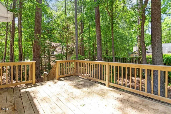 a view of a wooden fence