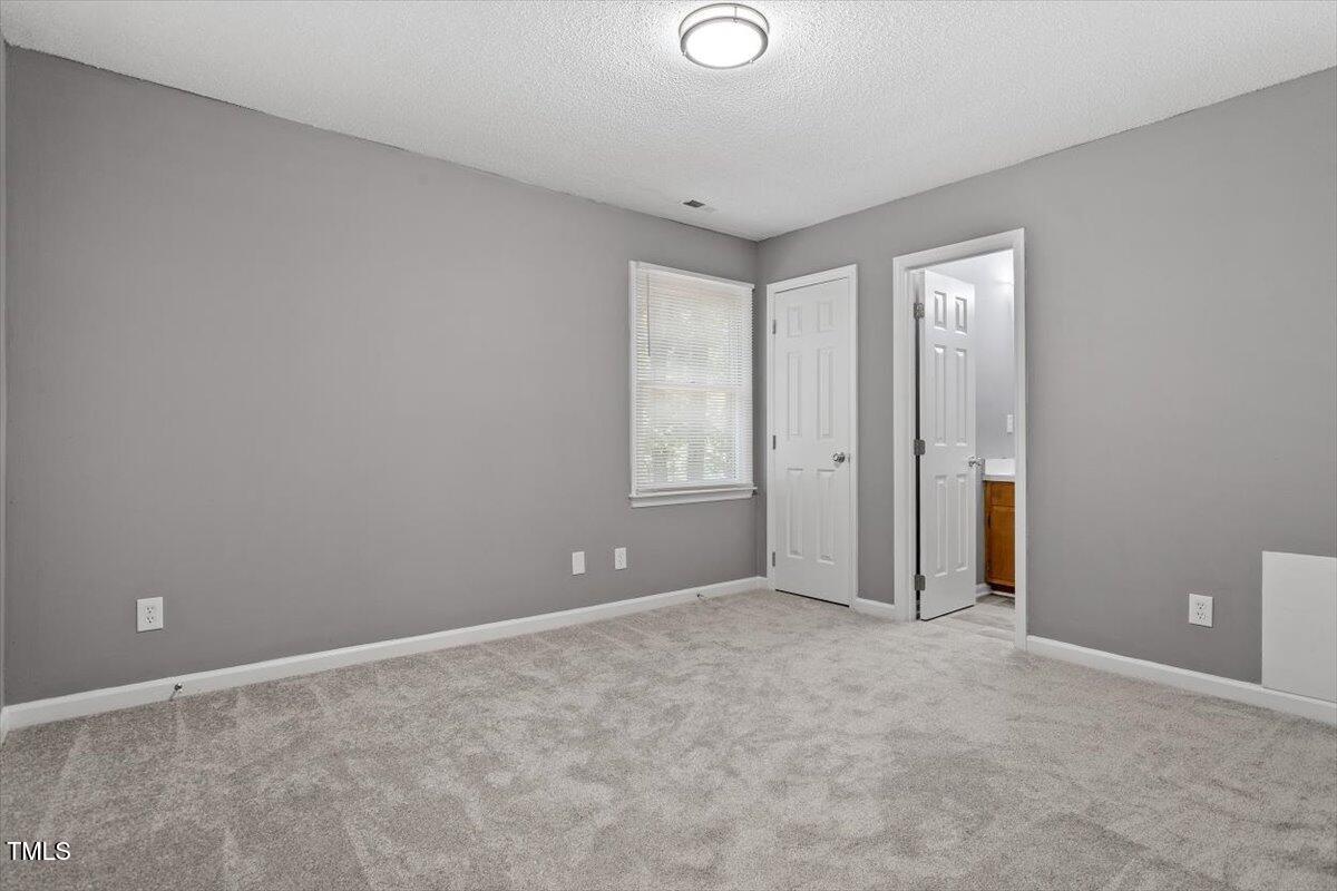 9 Tarawa Terrace, Unit A Durham, NC 27705 - Photo 9 of 12 a view of an empty room with a window