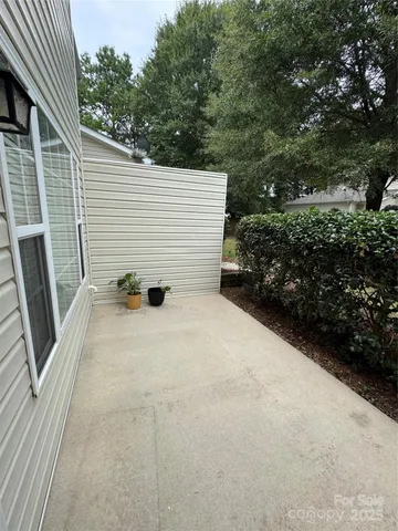 a view of a house with a yard and garage