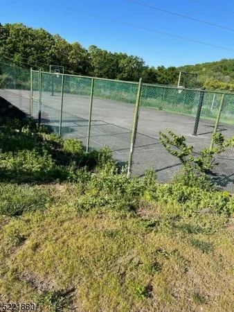 a view of a garden with a lake