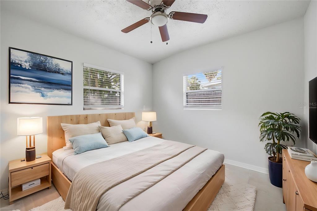 6629 Sierra Terrace New Port Richey, FL 34652 - Photo 16 of 30 a bedroom with bed and a window