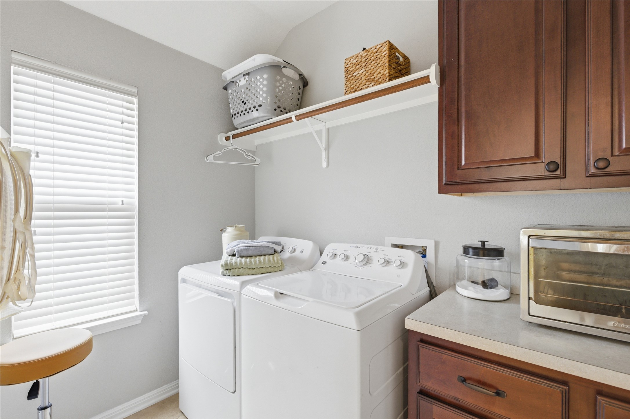1312 Rimstone Drive Cedar Park, TX 78613 - Photo 9 of 25 a utility room with dryer and washer
