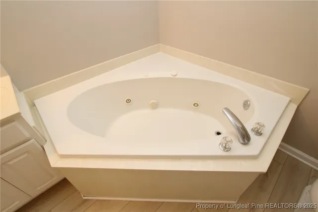 a bathroom with a bathtub