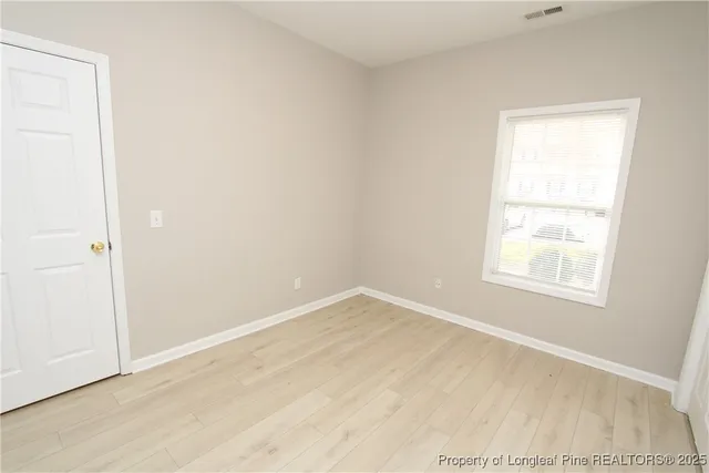 an empty room with a window