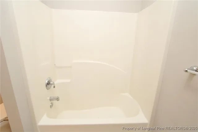 a close up of a bathtub