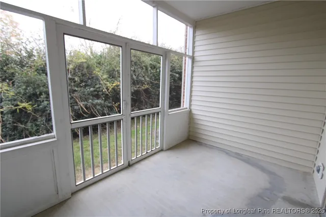 a view of a balcony with window