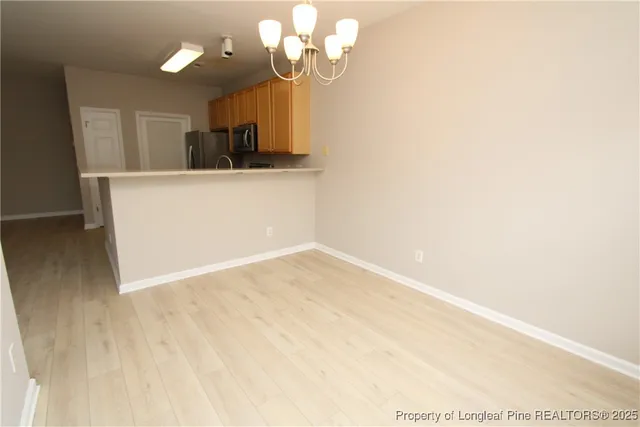 a view of a kitchen with a sink