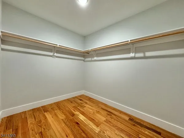 a bathroom with a toilet sink and shower