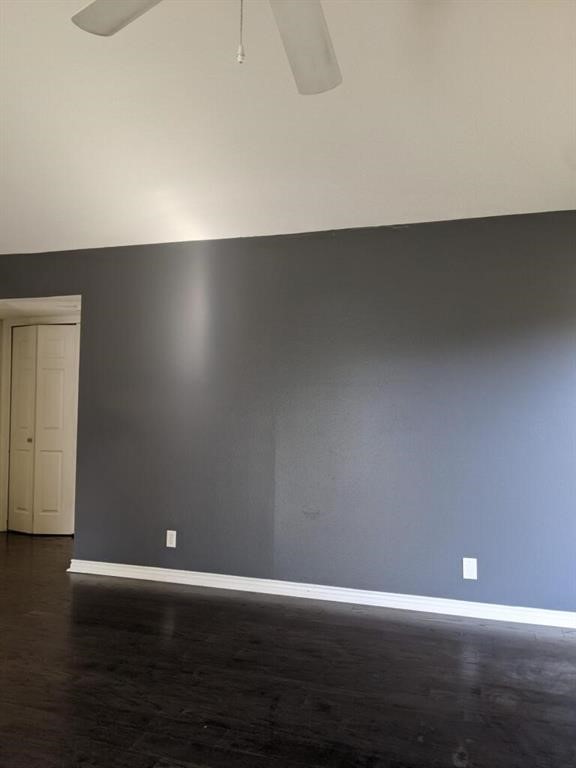 1601 Faro Drive, Unit 1704 Austin, TX 78741 - Photo 17 of 26 a view of room with wooden floor