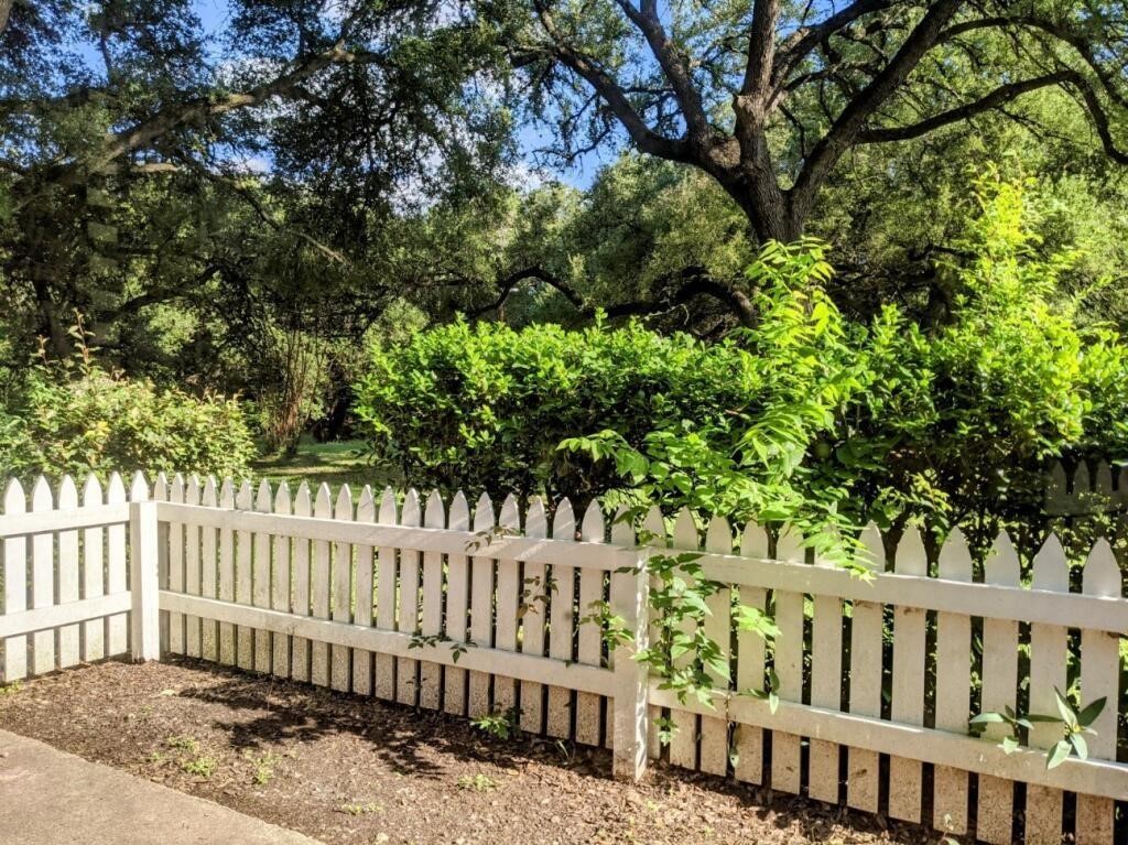 1601 Faro Drive, Unit 1704 Austin, TX 78741 - Photo 23 of 26 a view of a wooden fence