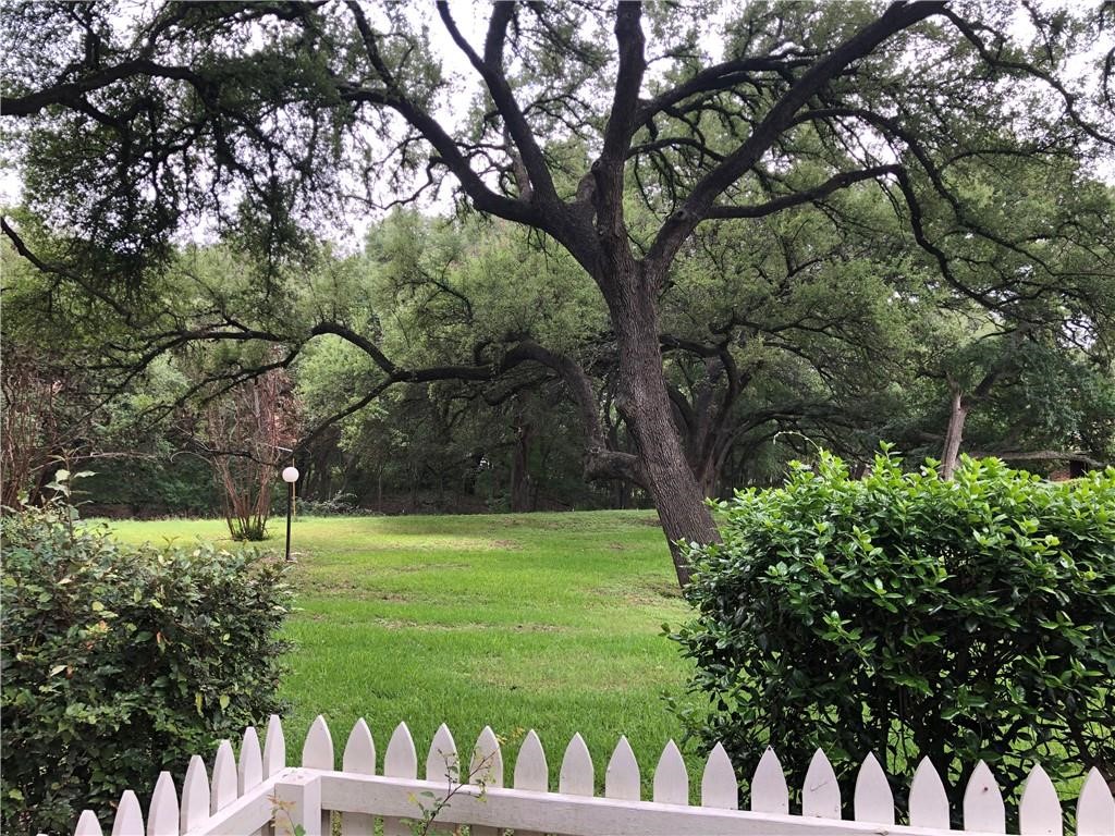 1601 Faro Drive, Unit 1704 Austin, TX 78741 - Photo 4 of 26 a view of a park with large trees