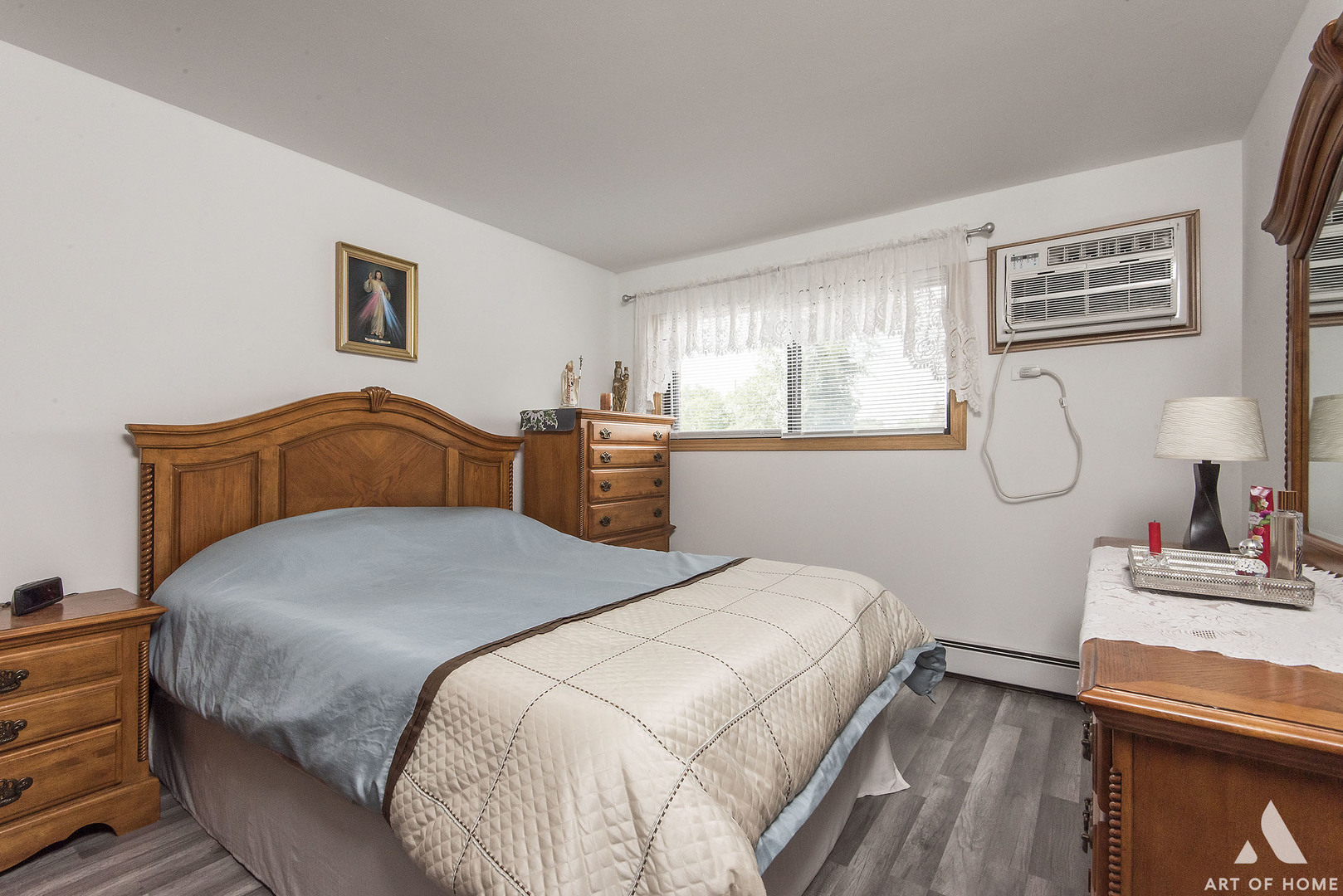 10612 Ridgemont Lane Chicago Ridge, IL 60415 - Photo 11 of 32 a bedroom with a bed and dresser with window
