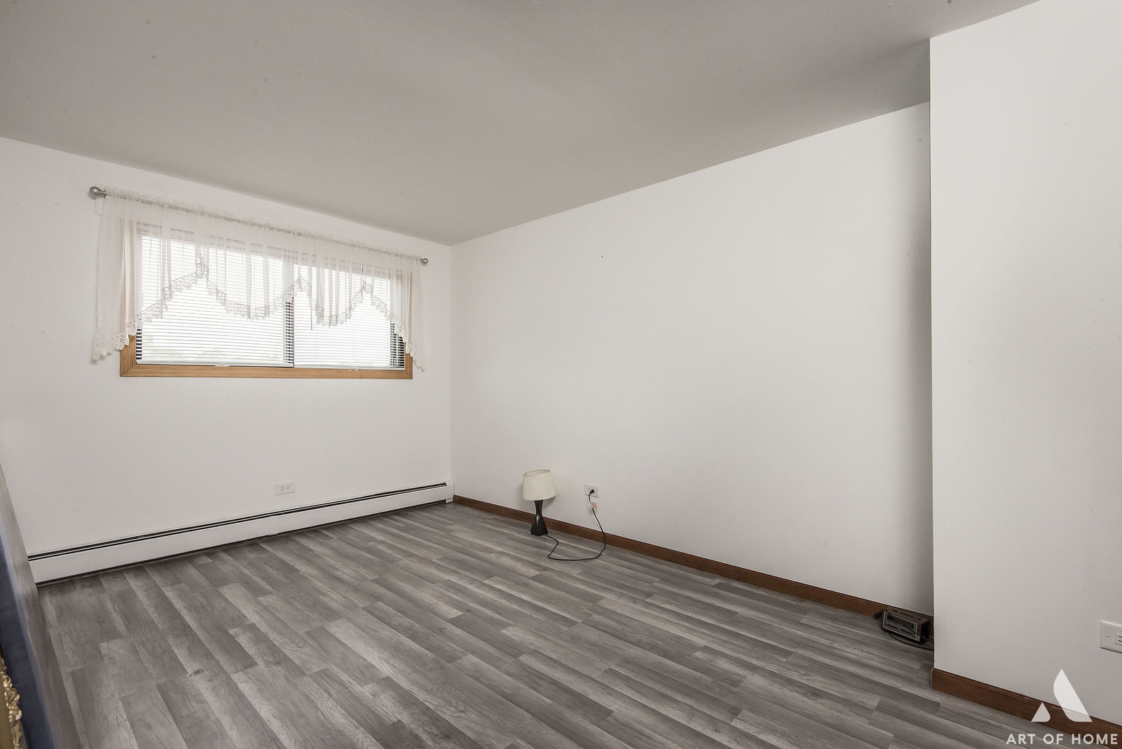 10612 Ridgemont Lane Chicago Ridge, IL 60415 - Photo 13 of 32 an empty room with wooden floor and windows