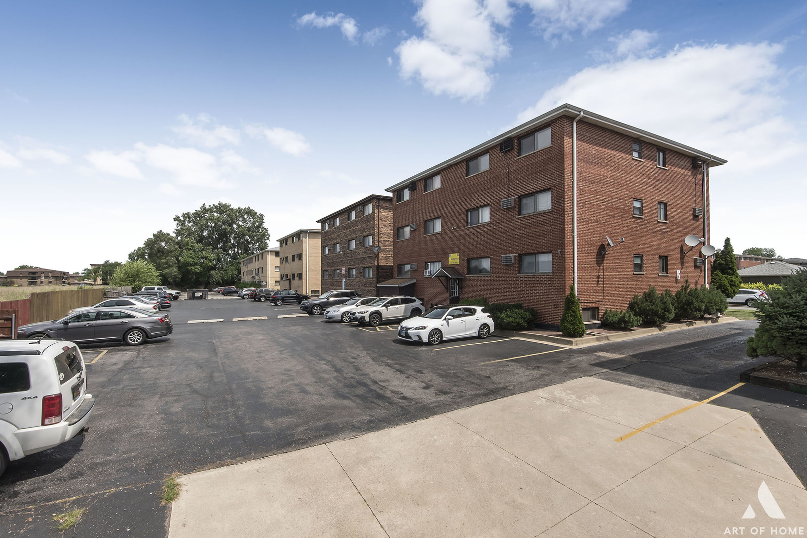 10612 Ridgemont Lane Chicago Ridge, IL 60415 - Photo 29 of 32 a front view of a building with cars parked