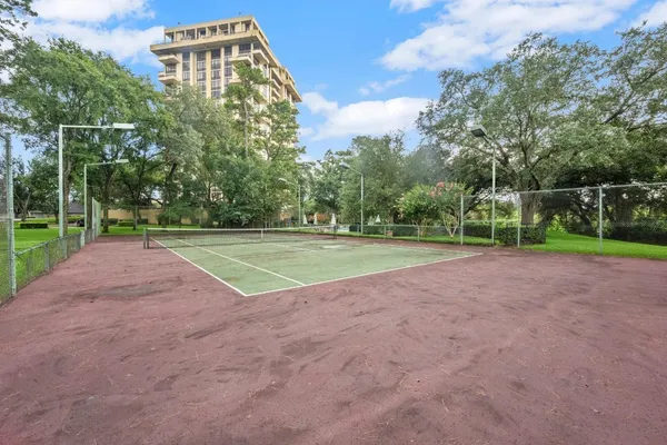 a view of a field with a big yard